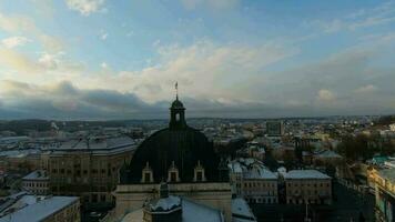 FPV drone flies around the Rynok Square, Lviv, Ukraine. Empty streets without people. Aerial view of the historical center of Lviv, UNESCO's cultural heritage video