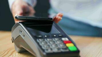 Contactless payment with your smartphone. Wireless payment concept video