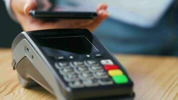 Contactless payment with your smartphone. Wireless payment concept video