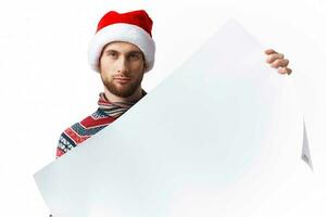 emotional man in New Year's clothes holding a banner holiday copy-space studio photo