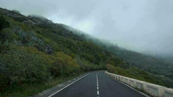 View of the mountain road in the clouds video