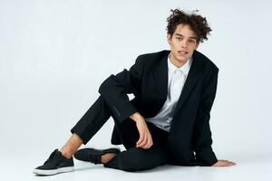 cute guy in suit curly hair blazer fashion self confidence photo