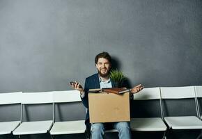 business man box with things job search waiting emotions photo