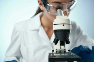 female doctor laboratory biotechnology and medicine analyzes photo