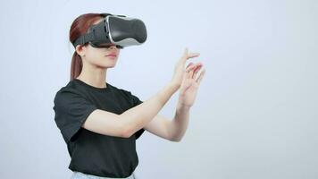 Asian girl opens the world, front view, new technology virtual reality headset video