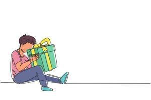 Single one line drawing cheerful boy sitting and hugging big gift box with ribbon bow wrapped in front of his in arms. Little kid accept birthday gift. Continuous line draw design vector illustration