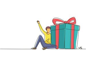 Single continuous line drawing loyalty program for regular clients. Businessman holds big gift box. Gift for holiday. Happy male sitting next to large gift. One line draw design vector illustration