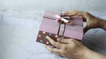 hand hold homemade gift box indoor video