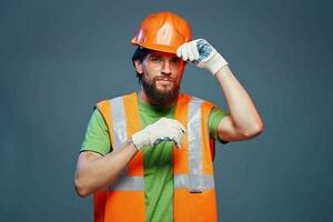 Emotional builder working uniform orange helmet safety Construction professional photo