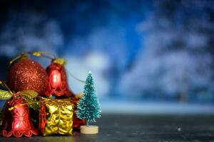Close up decoration christmas tree and christmas gifts isolated on bokeh background photo
