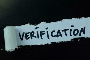 Verification Text written in torn paper photo