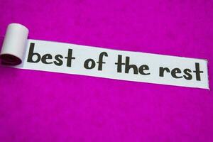 Best of The Rest text, Inspiration, Motivation and business concept on purple torn paper photo