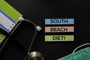 sur playa dieta en parte superior ver negro mesa y cuidado de la salud médico concepto. foto