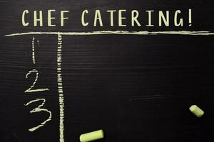 Chef Catering written with color chalk. Supported by an additional services. Blackboard concept photo