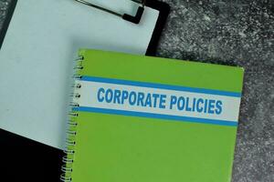 The Book of Corporate Policies on the table. Business concept photo