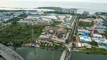 Aerial view of the Beautiful scenery of Jakarta Formula E Circuit. with Jakarta cityscape background. Jakarta, Indonesia, October 6, 2022 photo