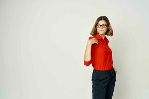 woman in business suit wearing glasses posing office official photo