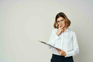 woman in white shirt work documents official professional photo