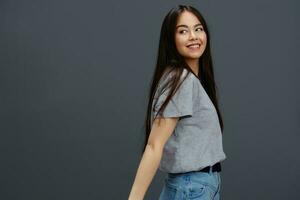 young woman casual wear gray t-shirt fashion charm studio model photo
