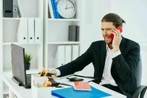 manager office work documents with a phone in hand technology photo