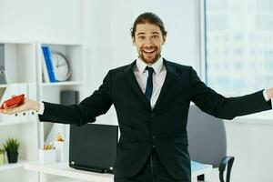 manager in the office with documents executive photo