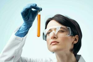 woman scientist laboratory research analyzes diagnostics photo