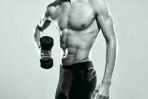 athletic man with pumped up abs motivation exercise workout photo