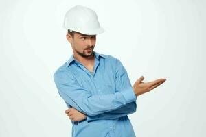 Male builder white helmet work professional industry photo