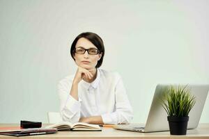 Businesswoman at the desk documents Professional Job light background photo
