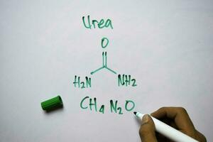urea molécula escrito en el blanco tablero. estructural químico fórmula. educación concepto foto