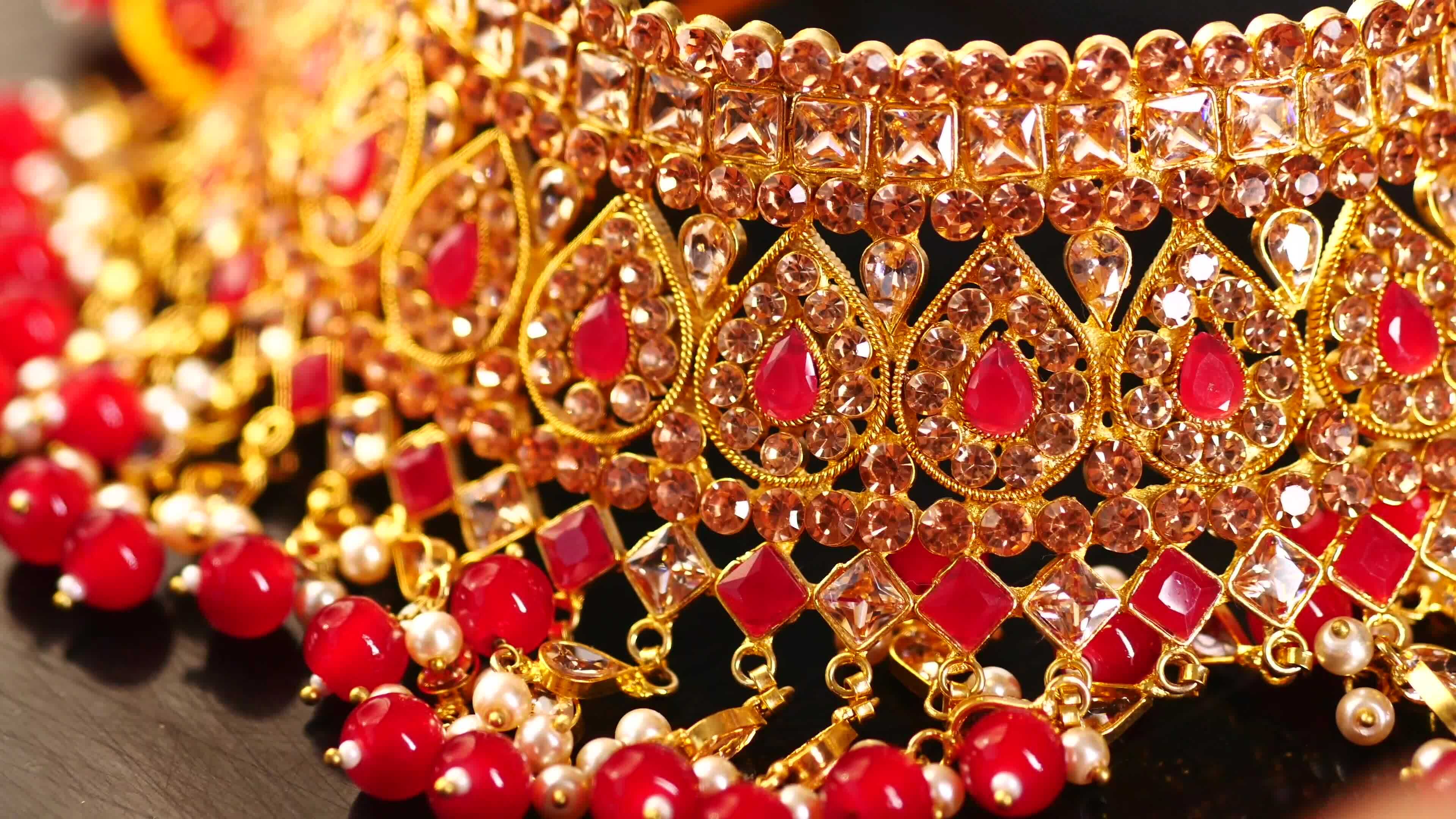 Jewelry, pendant and chain on table 23668894 Stock Video at Vecteezy