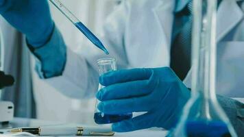 Medical Research LaboratoryPortrait of a Beautiful Female Scientist in Goggles Using Micro Pipette for Test Analysis. Advanced Scientific Lab for Medicine, Biotechnology, Microbiology Development video