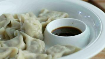 Close up of dim sum in a bowl video