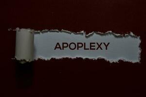 Apoplexy Text written in torn paper photo