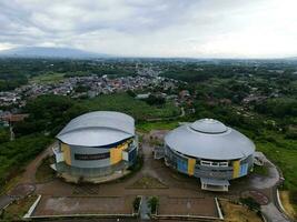 Aerial view of The largest stadium sports arena from drone. BOGOR, INDONESIA - JANUARY, 8, 2021 photo