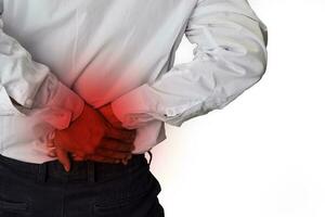 Feels pain in the small of the back. Back Pain, Physical Injury photo