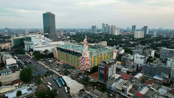 Aerial view of South Jakarta Blok M Intercity Bus Terminal. This terminal is the oldest terminal in Jakarta. Jakarta, Indonesia, September 16, 2022 photo