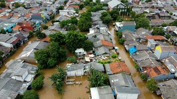 Aerial POV view Depiction of flooding. devastation wrought after massive natural disasters at Bekasi - Indonesia photo