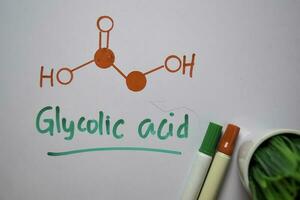 Glycolic acid molecule write on the white board. Structural chemical formula. Education concept photo