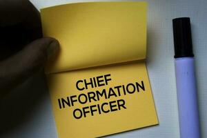 Chief Information Officer text on sticky notes isolated on office desk photo