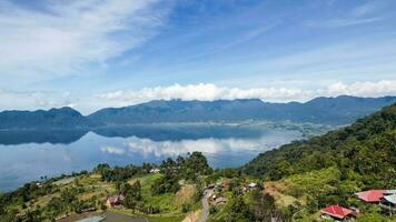 Aerial view of panorama of Maninjau Lake West Sumatra, Danau maninjau. sumatra, Indonesia, January 24, 2023 photo