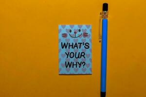 What's Your Why write on sticky notes isolated on Office Desk photo