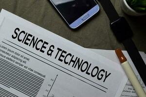 Science and Technology text in headline isolated on brown background. Newspaper concept photo