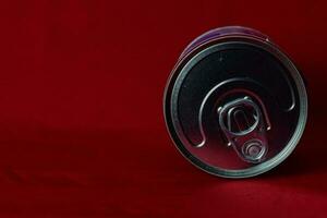 close up milk cans rolling in red background photo