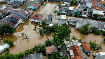 Aerial POV view Depiction of flooding. devastation wrought after massive natural disasters at Bekasi - Indonesia photo