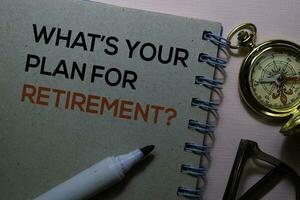 What's Your Plan For Retirement text on the book isolated on office desk photo