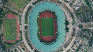 Aerial view of the Beautiful scenery of Pakansari Stadium. with Bogor cityscape background. Bogor, Indonesia, July 6, 2022 photo