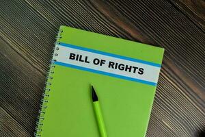 The Book of Bill of Rights isolated on Wooden Table. photo