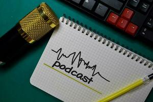 Podcast write on a book isolated on Office Desk photo