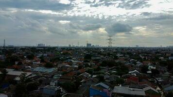 Aerial POV view Depiction of flooding. devastation wrought after massive natural disasters at Bekasi - Indonesia photo